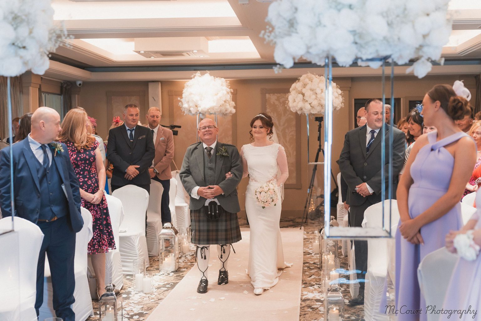 Father walking the bride down the isle at the Dalziel park hotel