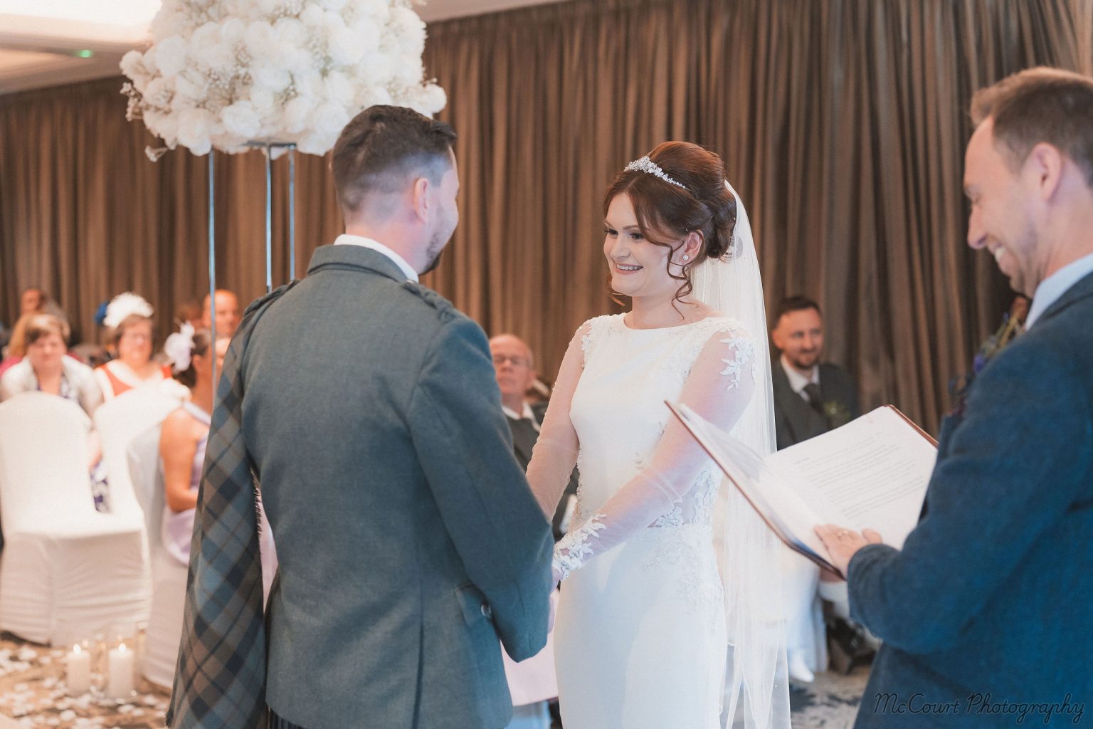 Bride and groom reciting their vows at the dalziel park hotel