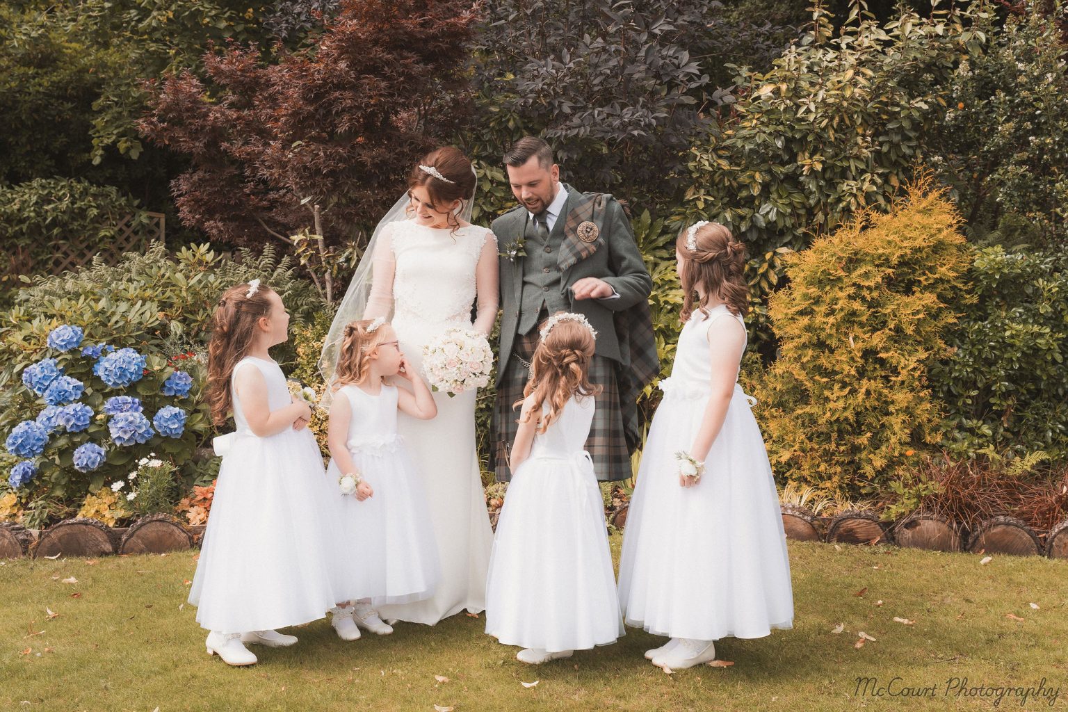 Group shot with flower girls at dalziel park hotel