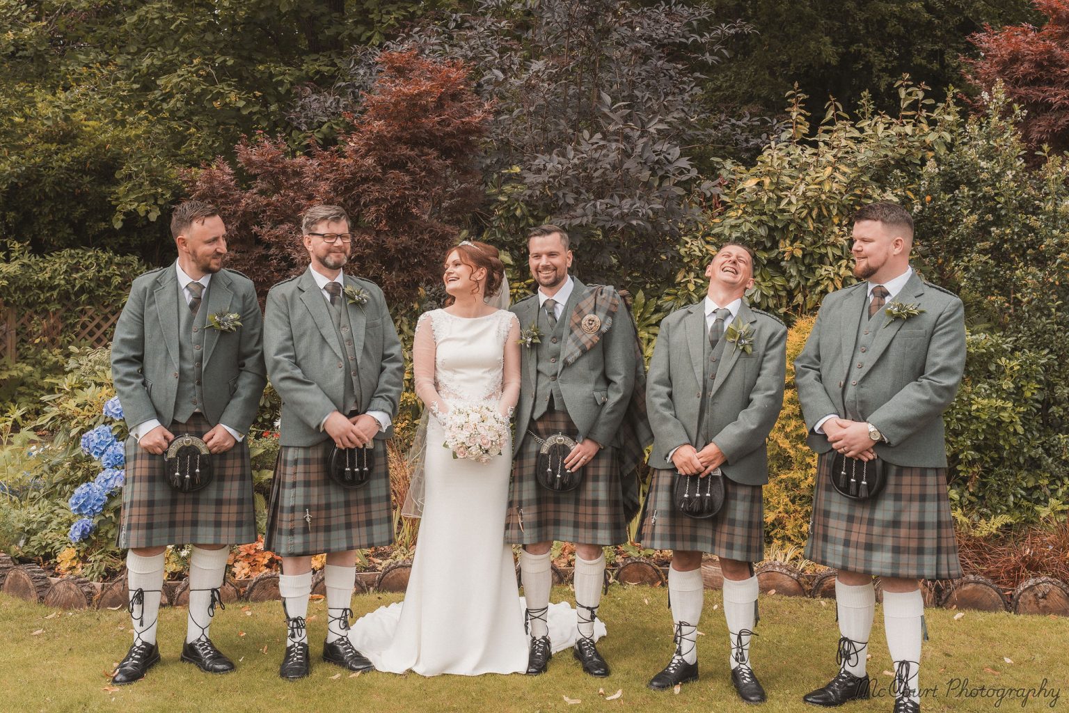 Group shot with grooms men at dalziel park hotel wedding