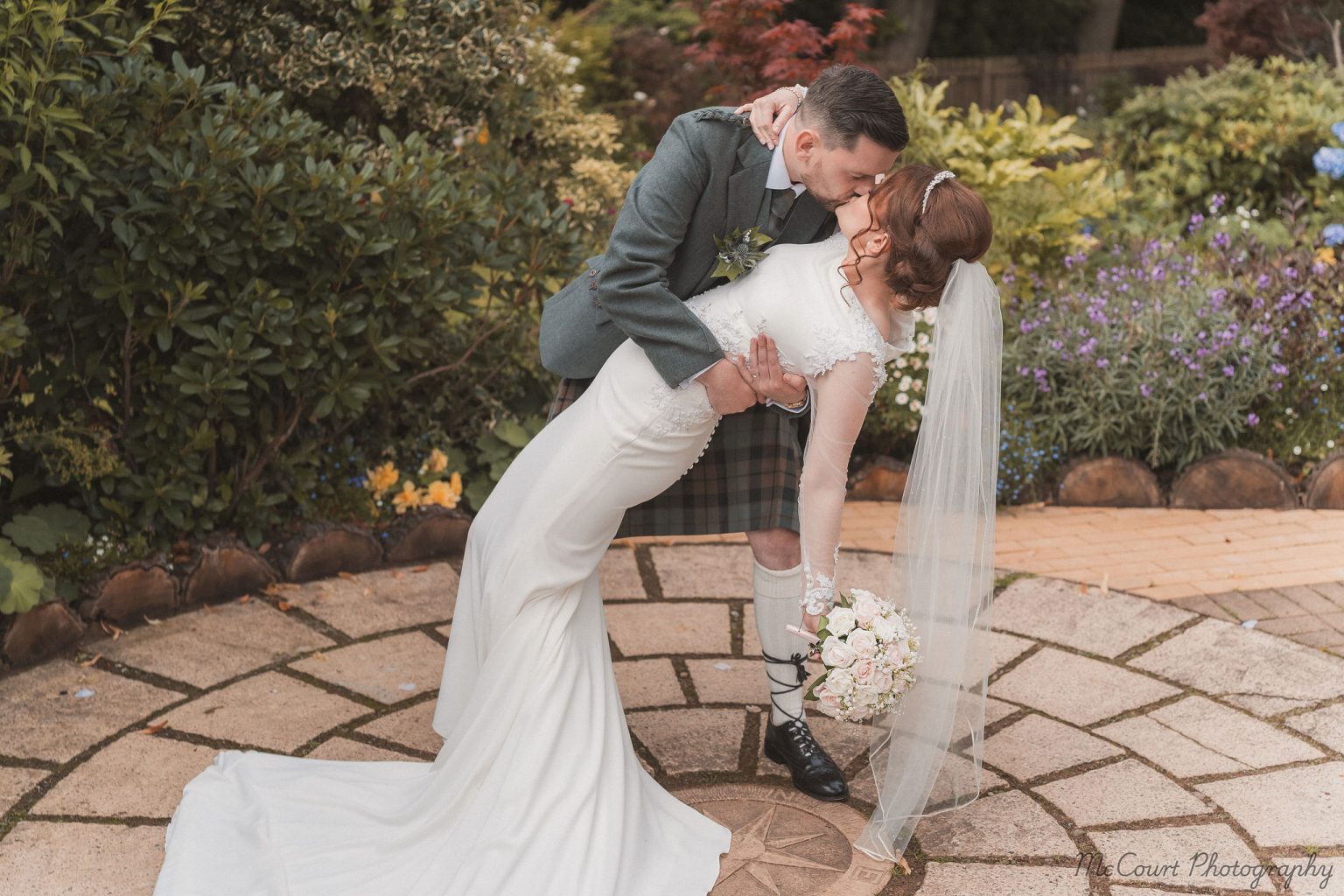 Couples shoot after wedding in dalziel park hotel garden