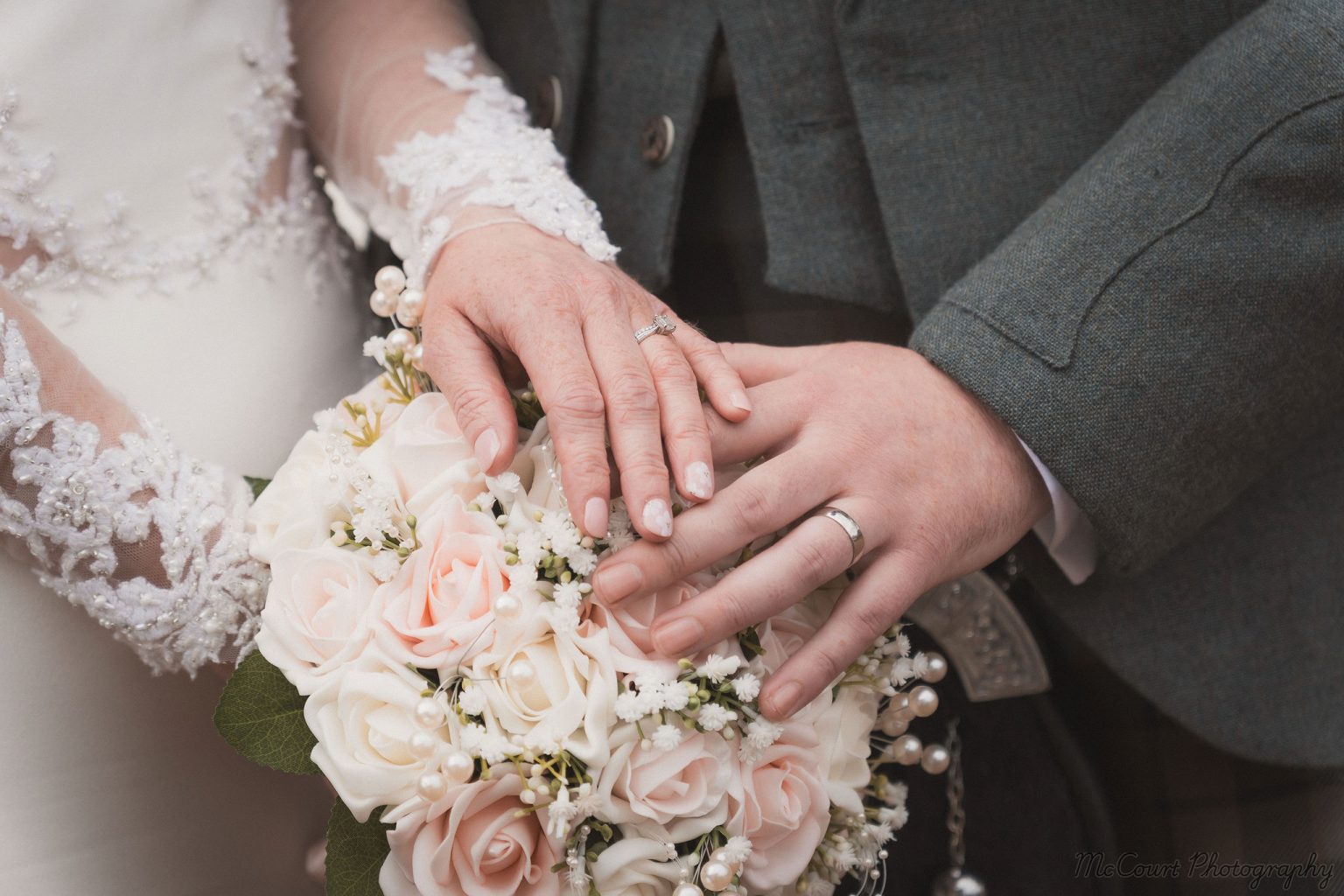 Picture of the rings and bouquet for patrick and sarah wedding at dalziel park hotel